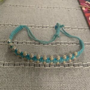 Light blue and silver adjustable bracelet